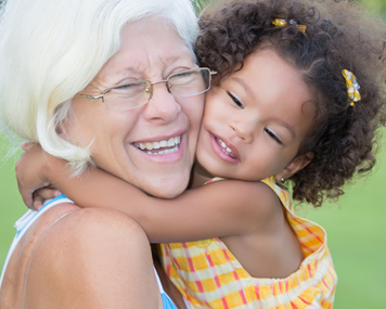 homepage-feature-grandma grandma getting hugs from toddler